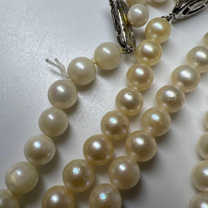 Three-strand Akoya pearl necklace with pearls measuring 6.8 to 6.9 cm in diameter