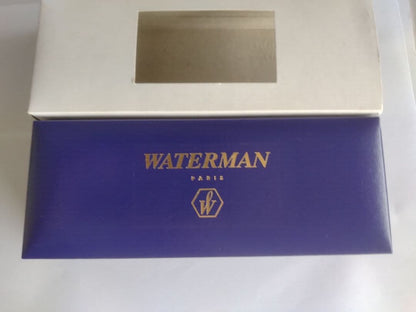 Waterman ballpoint pen in blue marble pattern with gold trim and twist mechanism, displayed with dedicated case