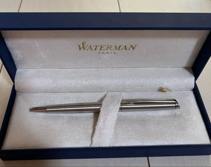 Silver Waterman ballpoint pen with sleek metallic finish shown with its outer box