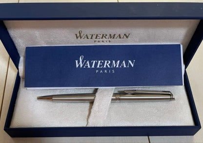 Silver Waterman ballpoint pen with sleek metallic finish shown with its outer box