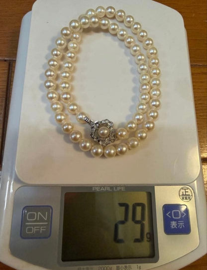 Honest Tsubamaki Akoya pearl necklace with 6.5mm pearls and strong shine on a white background