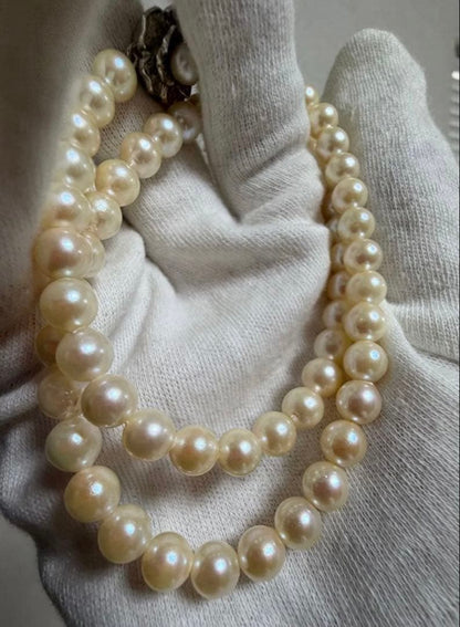Honest Tsubamaki Akoya pearl necklace with 6.5mm pearls and strong shine on a white background