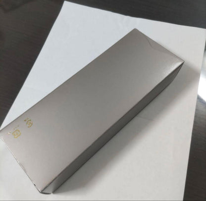 New Pilot Graice fountain pen in black and gold with 14k gold nib shown uncapped and writing