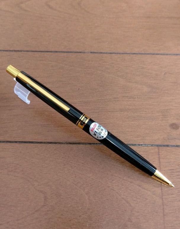 Pilot mechanical pencil and ballpoint pen set in a dedicated case showing pencil and pen with black ink