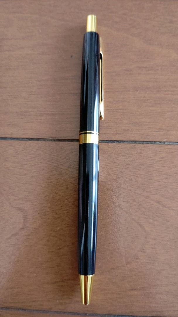 Pilot mechanical pencil and ballpoint pen set in a dedicated case showing pencil and pen with black ink