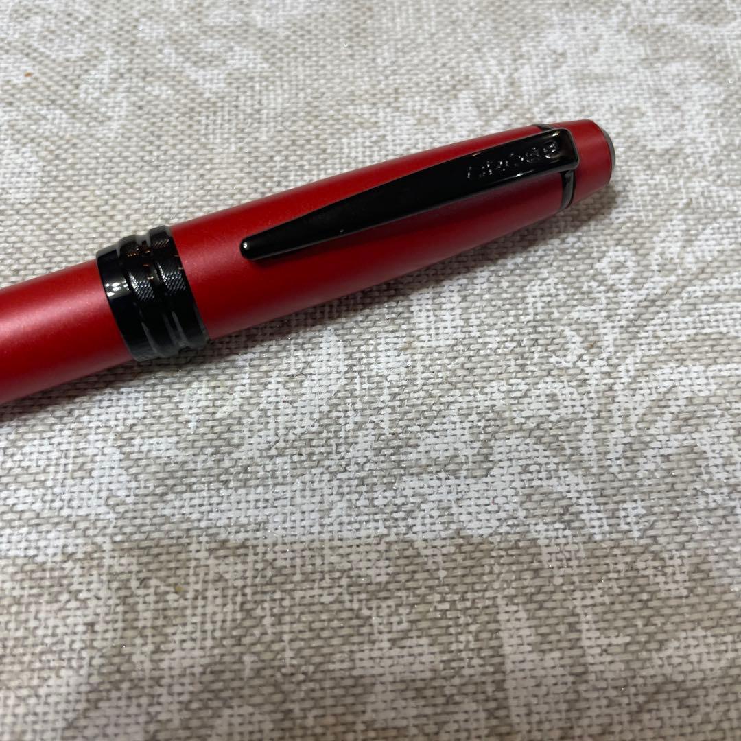 Used Cross Cap-style Ballpoint Pen No.143 with oil-based ink and black ink color, minor scratches visible