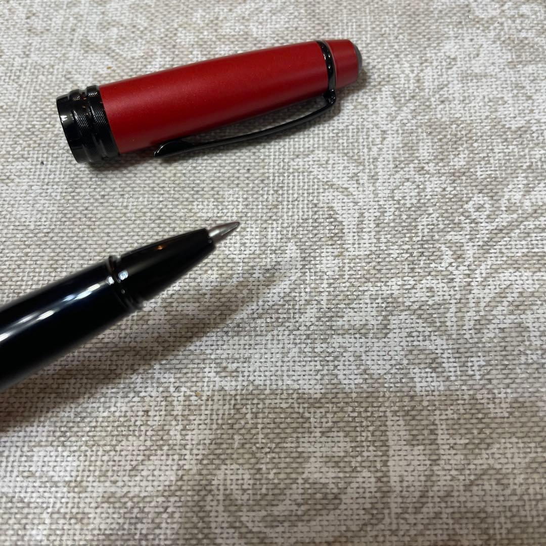 Used Cross Cap-style Ballpoint Pen No.143 with oil-based ink and black ink color, minor scratches visible