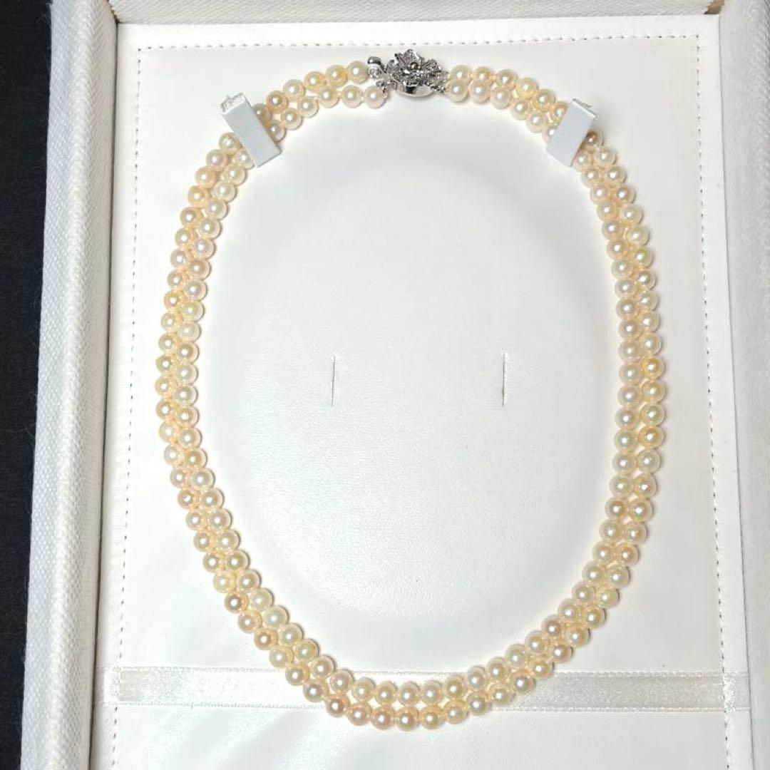 Two-strand Akoya pearl necklace featuring baby pearls sized 5.0-5.4mm, 41 cm length