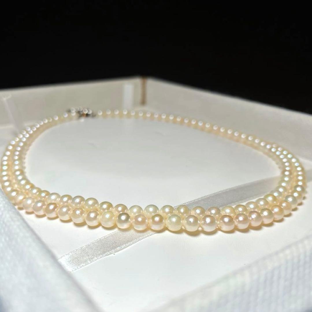 Two-strand Akoya pearl necklace featuring baby pearls sized 5.0-5.4mm, 41 cm length