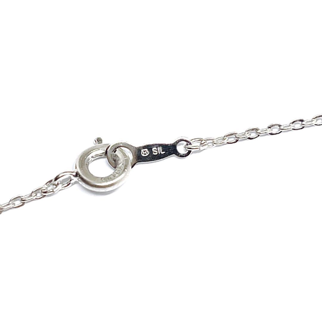 MIKIMOTO pearl necklace with 3.8mm pearls and silver cross ribbon on a 40cm chain