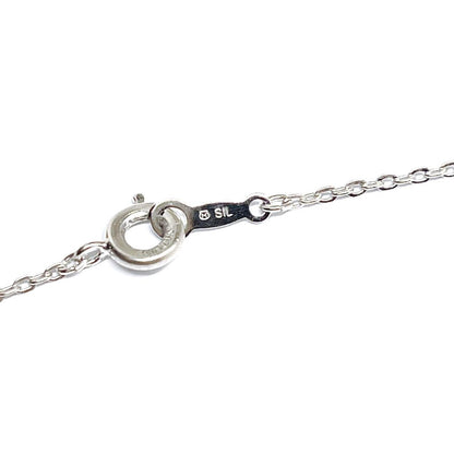 MIKIMOTO pearl necklace with 3.8mm pearls and silver cross ribbon on a 40cm chain