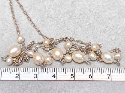 Agete pearl necklace featuring two silver925 strands with pearls, approximately 82 cm long