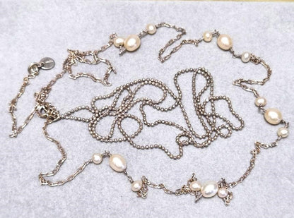 Agete pearl necklace featuring two silver925 strands with pearls, approximately 82 cm long