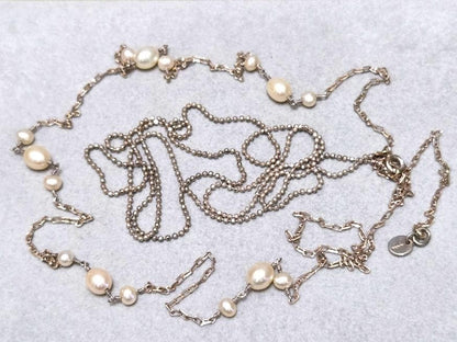 Agete pearl necklace featuring two silver925 strands with pearls, approximately 82 cm long