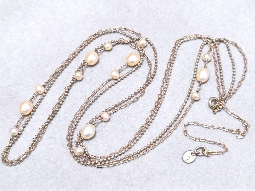 Agete pearl necklace featuring two silver925 strands with pearls, approximately 82 cm long