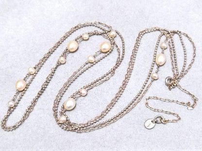 Agete pearl necklace featuring two silver925 strands with pearls, approximately 82 cm long