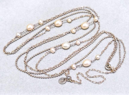 Agete pearl necklace featuring two silver925 strands with pearls, approximately 82 cm long