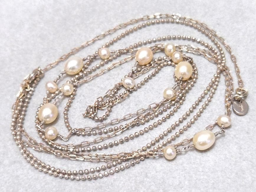 Agete pearl necklace featuring two silver925 strands with pearls, approximately 82 cm long