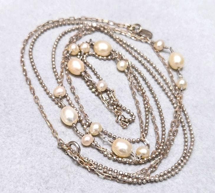 Agete pearl necklace featuring two silver925 strands with pearls, approximately 82 cm long