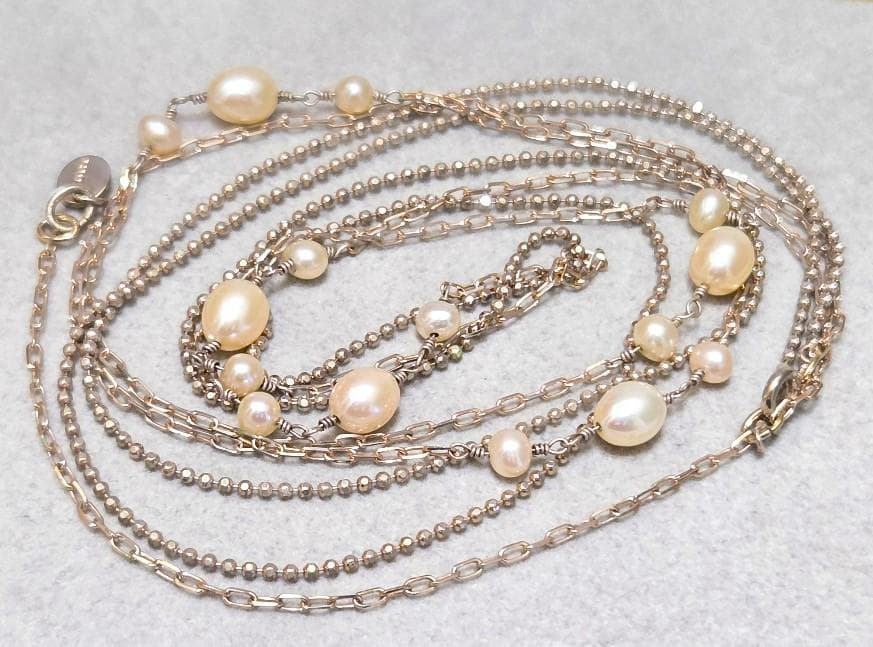 Agete pearl necklace featuring two silver925 strands with pearls, approximately 82 cm long