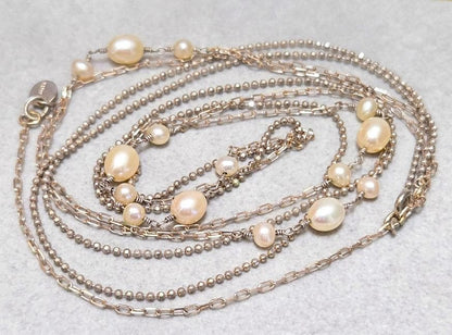 Agete pearl necklace featuring two silver925 strands with pearls, approximately 82 cm long