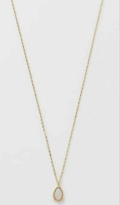 Current Model Agate K10 necklace with opal pendant measuring 0.6 by 0.4 cm on 40 cm gold chain