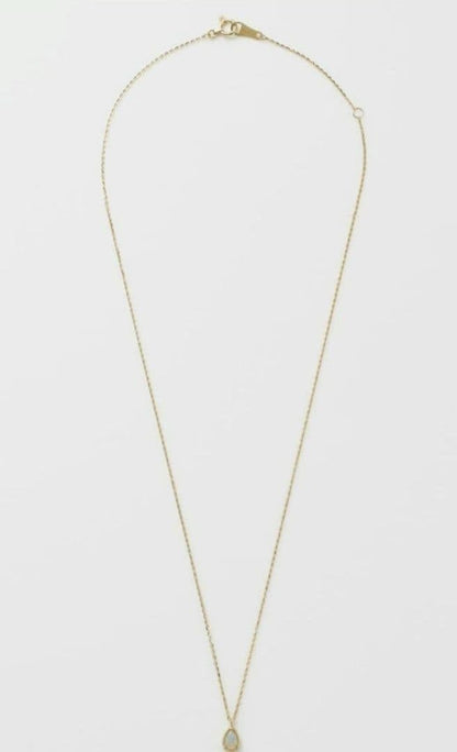 Current Model Agate K10 necklace with opal pendant measuring 0.6 by 0.4 cm on 40 cm gold chain