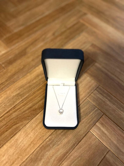 Baby Ring with Akoya Pearl on a 40cm platinum necklace chain