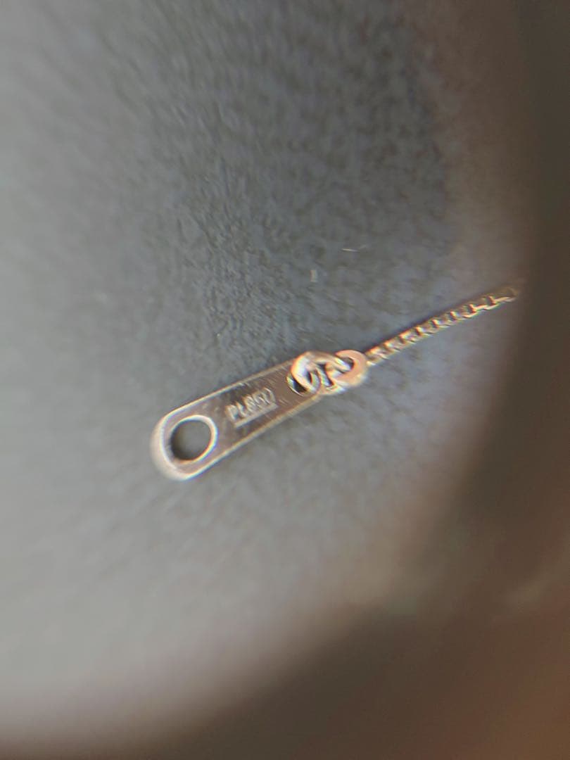 Baby Ring with Akoya Pearl on a 40cm platinum necklace chain