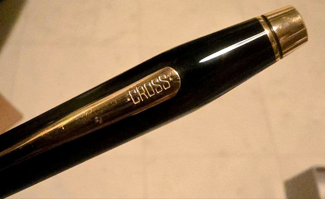 Cross ballpoint pen with black body and gold trim classic century design