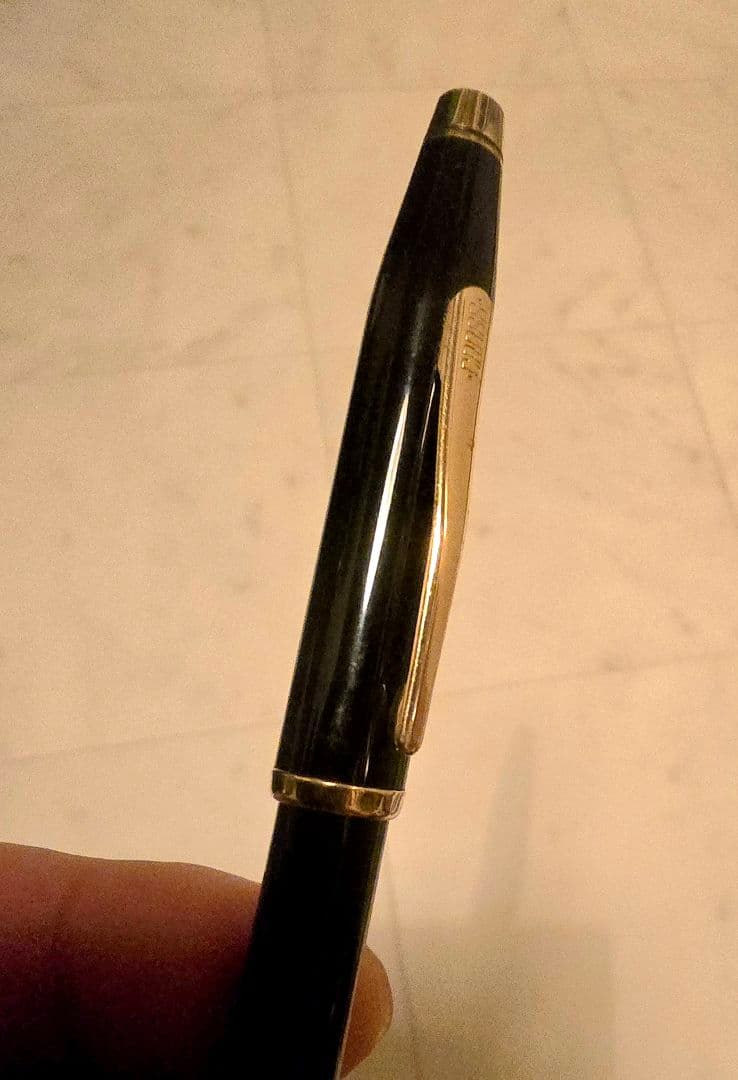 Cross ballpoint pen with black body and gold trim classic century design