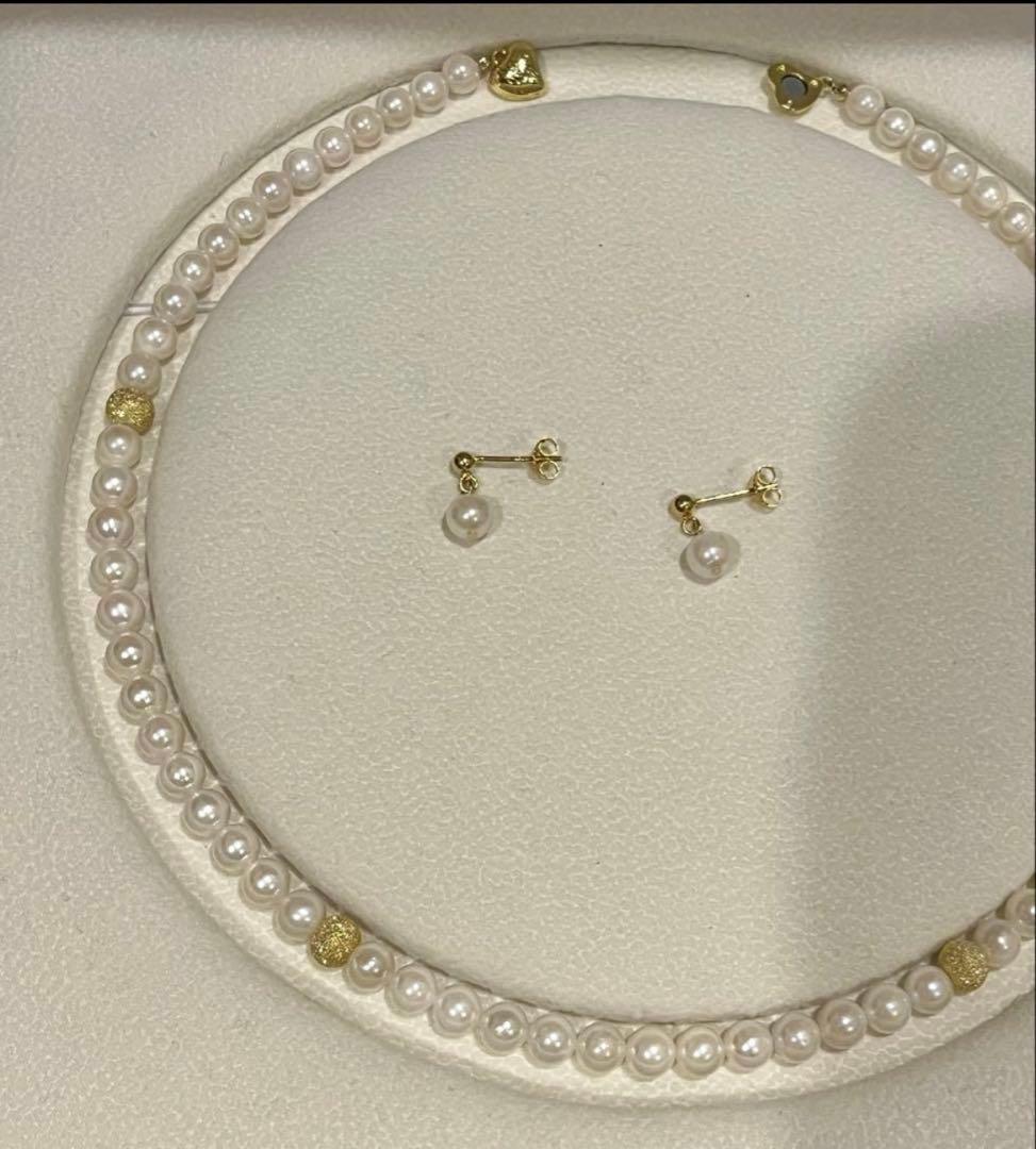 Akoya pearl necklace and matching earrings set with 5.5-6mm pearls and 40cm necklace length on white background