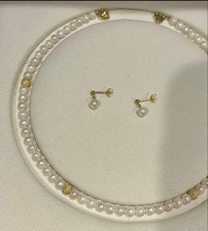 Akoya pearl necklace and matching earrings set with 5.5-6mm pearls and 40cm necklace length on white background