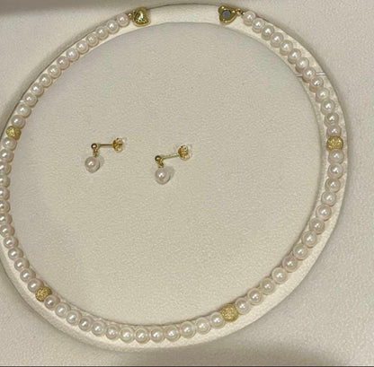 Akoya pearl necklace and matching earrings set with 5.5-6mm pearls and 40cm necklace length on white background