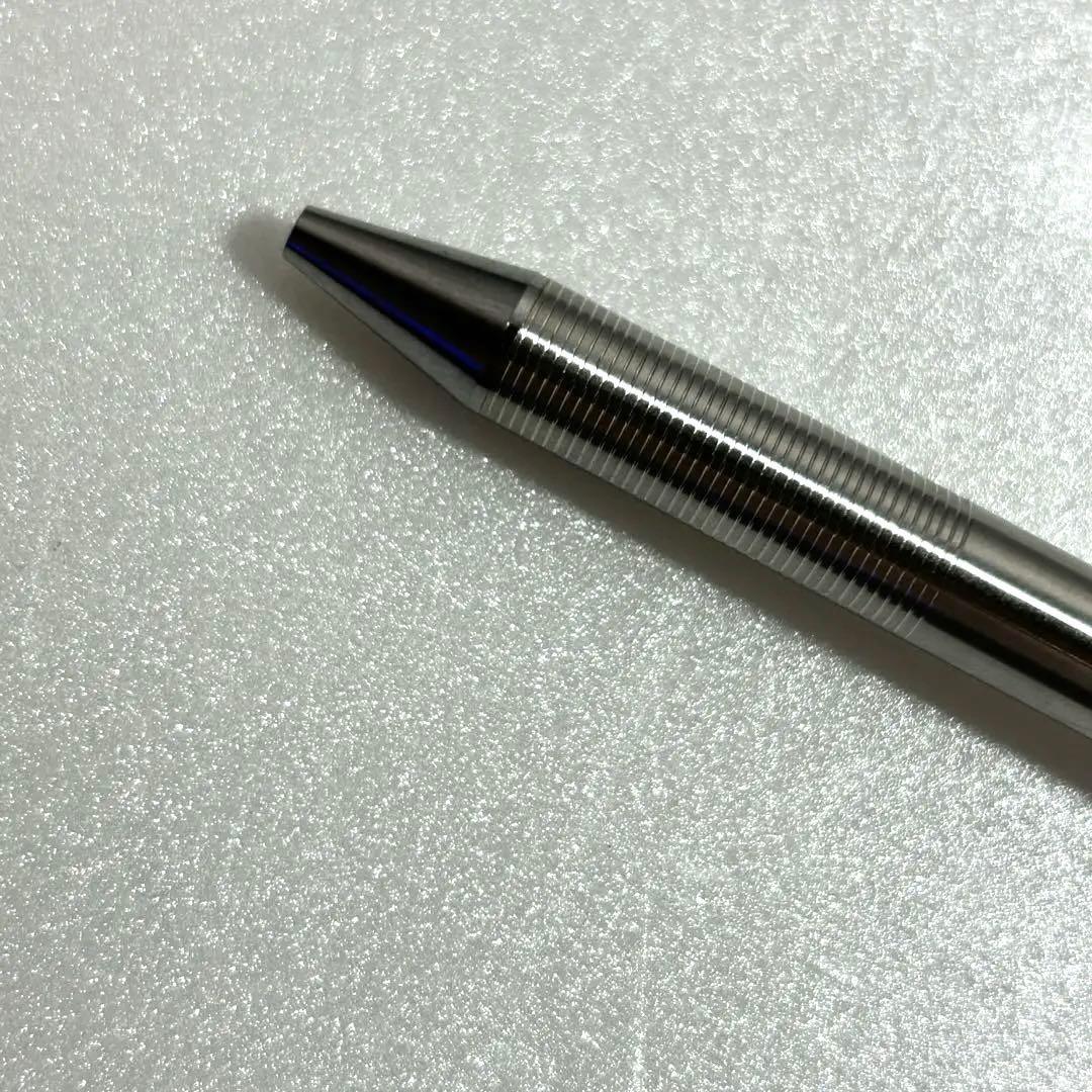 Discontinued Pilot Twist ballpoint pen in silver with two color ink mechanism, used condition