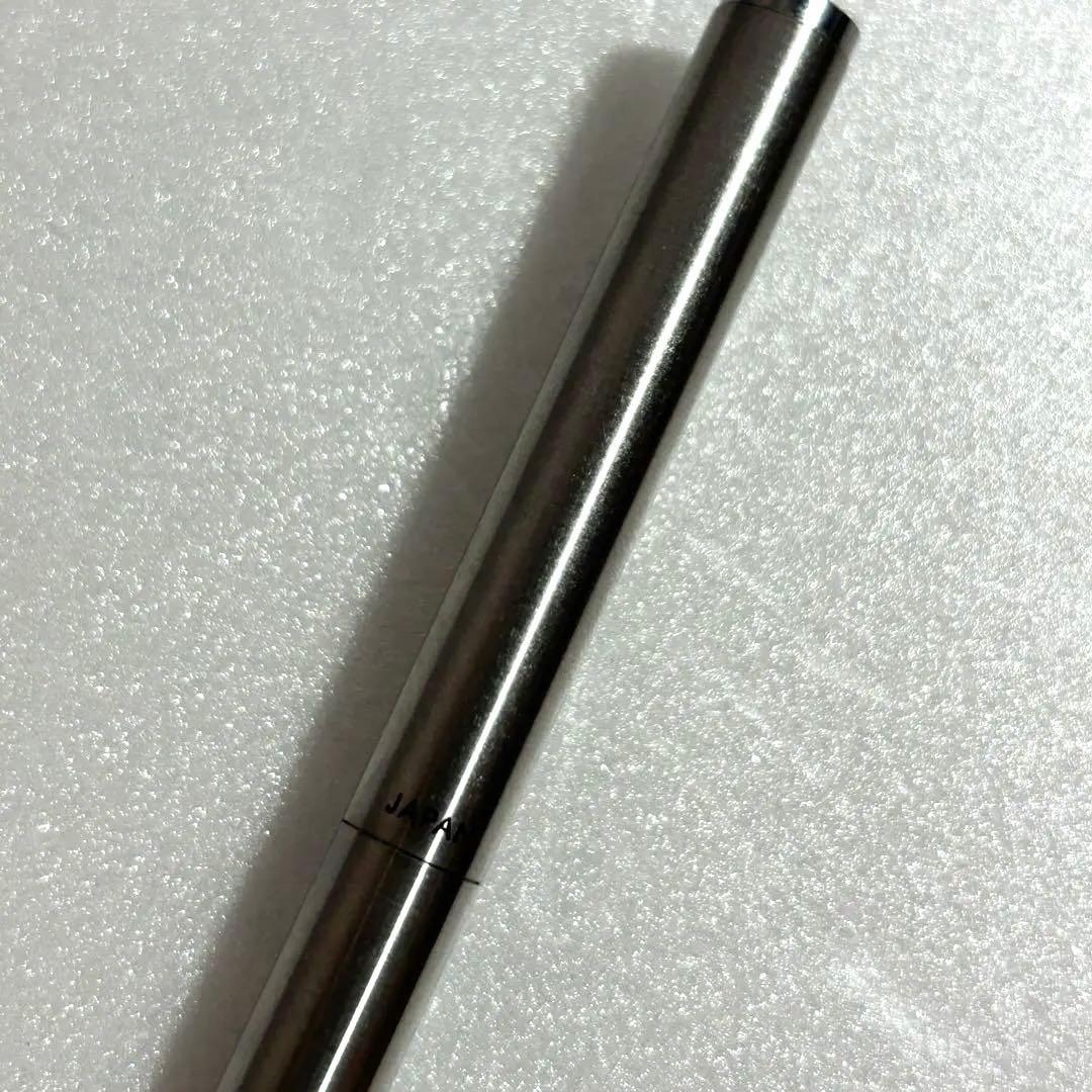 Discontinued Pilot Twist ballpoint pen in silver with two color ink mechanism, used condition