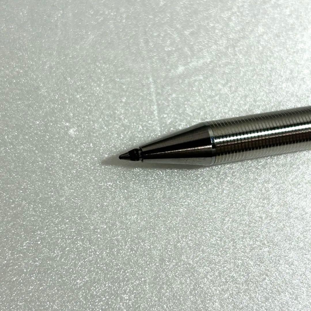 Discontinued Pilot Twist ballpoint pen in silver with two color ink mechanism, used condition