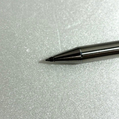 Discontinued Pilot Twist ballpoint pen in silver with two color ink mechanism, used condition