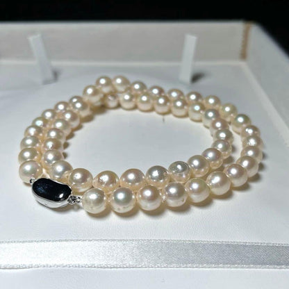 Akoya pearl necklace with 7.1-7.4mm semi-round white pearls and silver chain, 43cm length