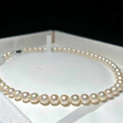 Akoya pearl necklace with 7.1-7.4mm semi-round white pearls and silver chain, 43cm length