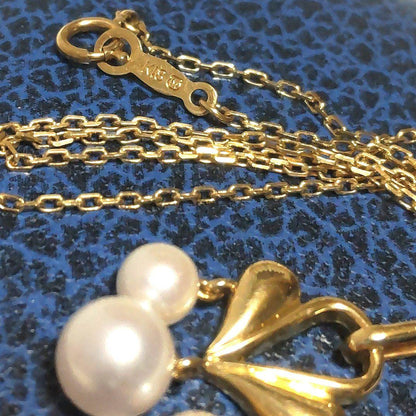 MIKIMOTO Akoya pearl necklace featuring 5-6.2mm pearls with a 25x15mm moving pearl pendant on a 40cm chain