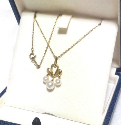 MIKIMOTO Akoya pearl necklace featuring 5-6.2mm pearls with a 25x15mm moving pearl pendant on a 40cm chain