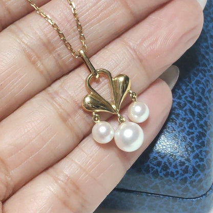 MIKIMOTO Akoya pearl necklace featuring 5-6.2mm pearls with a 25x15mm moving pearl pendant on a 40cm chain