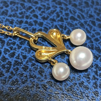 MIKIMOTO Akoya pearl necklace featuring 5-6.2mm pearls with a 25x15mm moving pearl pendant on a 40cm chain