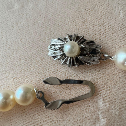 Small pearl necklace featuring 60 round Akoya pearls sized 6.8mm on a 42cm strand