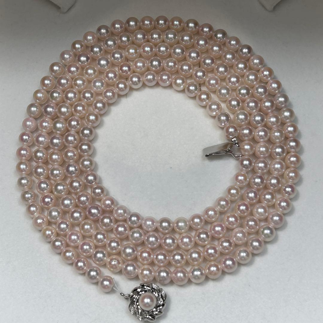 Long Akoya pearl necklace with 6.5mm pink pearls measuring 124cm with sterling silver details