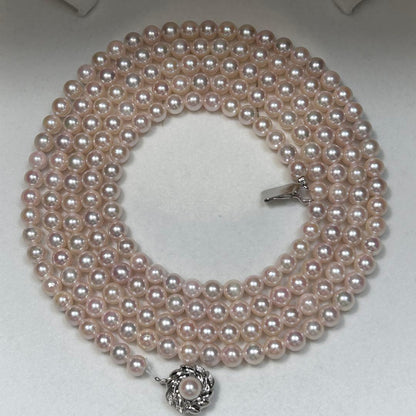 Long Akoya pearl necklace with 6.5mm pink pearls measuring 124cm with sterling silver details
