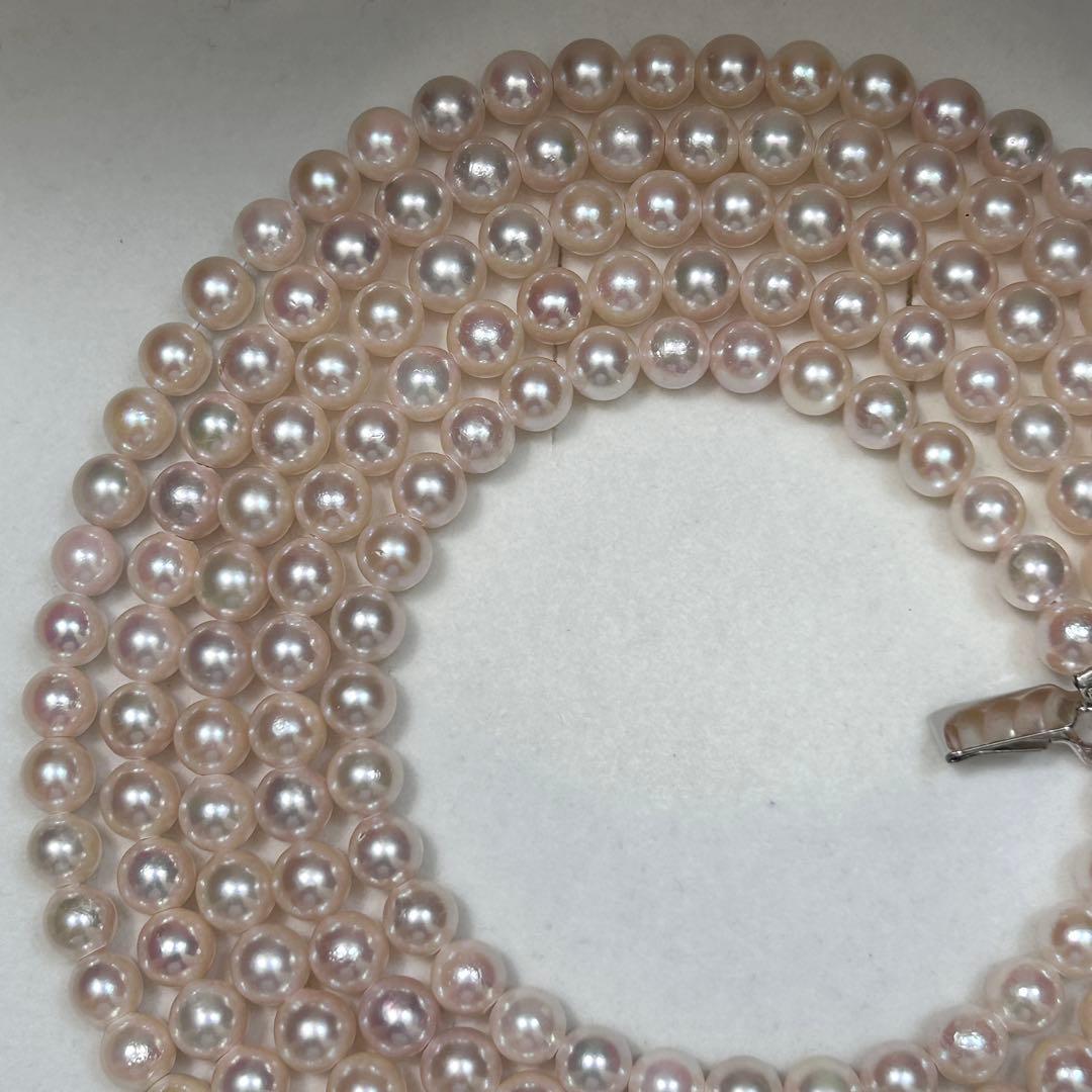 Long Akoya pearl necklace with 6.5mm pink pearls measuring 124cm with sterling silver details
