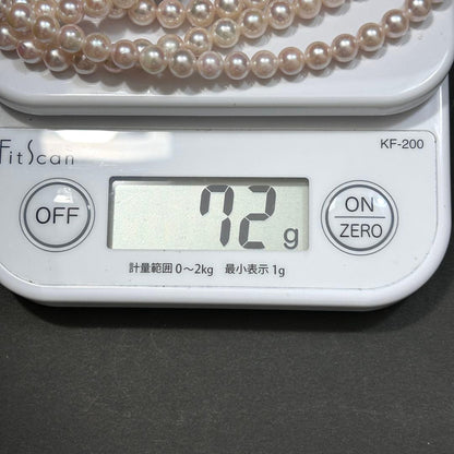 Long Akoya pearl necklace with 6.5mm pink pearls measuring 124cm with sterling silver details