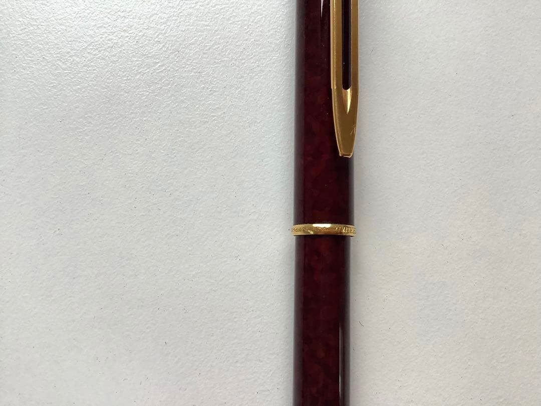 Used Waterman ballpoint pen without ink cartridge displayed on white background